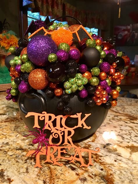 Dollar Store Witch Cauldron Decorating Tips for a Creepy Halloween Mantel